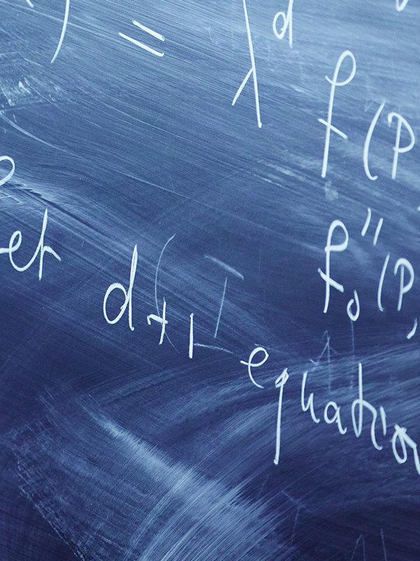Calculations on a black board.