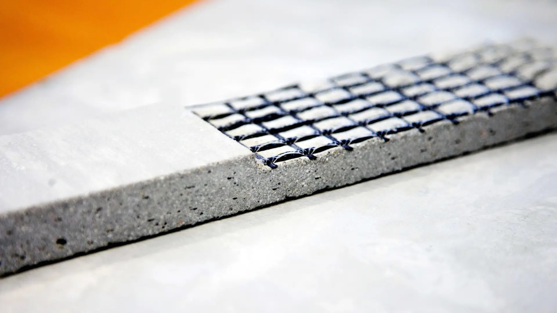 Carbon fibre reinforced concrete slab with visible mesh 