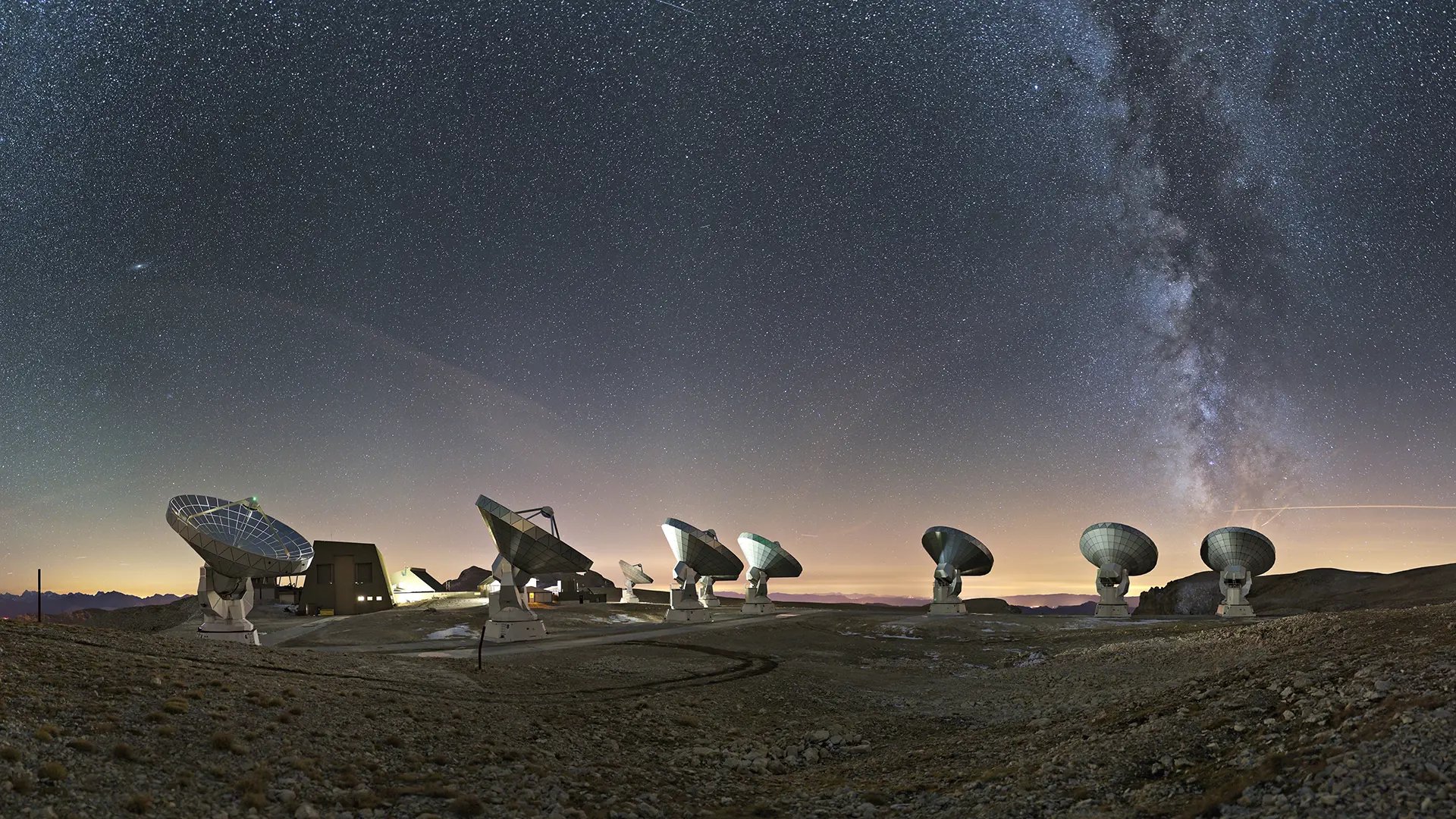 Radio telescope antennas under the night sky